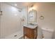 Updated bathroom with walk-in shower, vanity with marble top, and new toilet at 5750 Edna Ave, Las Vegas, NV 89146