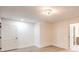 Bright bedroom with hardwood floors and access to a bathroom at 5750 Edna Ave, Las Vegas, NV 89146