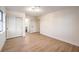 Spacious bedroom featuring light wood floors and built-in closet at 5750 Edna Ave, Las Vegas, NV 89146