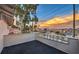 Private deck with city views and sunset at 5750 Edna Ave, Las Vegas, NV 89146