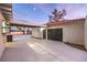 Attached garage with automatic door, offering convenient access at 5750 Edna Ave, Las Vegas, NV 89146