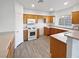 Well-equipped kitchen featuring ample cabinetry and modern appliances at 5965 Palmilla St # 2, North Las Vegas, NV 89031