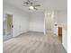 Living room with patio access and ceiling fan at 5965 Palmilla St # 2, North Las Vegas, NV 89031