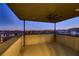 Expansive balcony with a ceiling fan and panoramic views of the city skyline at 6289 Redstone Hills Dr, Las Vegas, NV 89148
