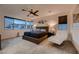 Stylish bedroom with expansive windows, designer lighting, and contemporary decor at 6289 Redstone Hills Dr, Las Vegas, NV 89148
