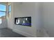 Modern fireplace in a sleek, minimalist room with contemporary finishes and ample natural light at 6289 Redstone Hills Dr, Las Vegas, NV 89148