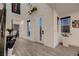 Bright foyer features wood flooring, modern decor, and a welcoming atmosphere at 6289 Redstone Hills Dr, Las Vegas, NV 89148