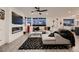 Stylish living room features a modern fireplace, sleek sectional sofa, and contemporary decor at 6289 Redstone Hills Dr, Las Vegas, NV 89148