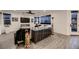 Chic living room featuring modern decor, contemporary furniture, and a seamless transition to outdoor spaces at 6289 Redstone Hills Dr, Las Vegas, NV 89148