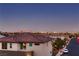 Residential view showcasing neatly arranged houses and tranquil streets under a twilight sky at 6289 Redstone Hills Dr, Las Vegas, NV 89148