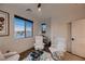 Bright sitting area with hardwood floors and large window at 6289 Redstone Hills Dr, Las Vegas, NV 89148