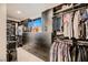 Organized walk-in closet features custom shelving, drawers and ample storage space at 6289 Redstone Hills Dr, Las Vegas, NV 89148
