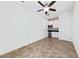 Finished basement room with a kitchenette and tile flooring at 6333 Supernova Hill St, North Las Vegas, NV 89031