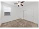 Bedroom with ceiling fan and sliding door closet at 6333 Supernova Hill St, North Las Vegas, NV 89031