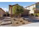 House exterior showcasing a landscaped front yard and walkway at 6333 Supernova Hill St, North Las Vegas, NV 89031