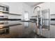 Close-up of kitchen countertop showcasing granite and modern faucet at 6333 Supernova Hill St, North Las Vegas, NV 89031