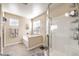 Bathroom boasts a soaking tub, walk-in shower, and modern fixtures at 6737 Fast Brook Ct, North Las Vegas, NV 89084