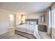 Main bedroom with king-size bed and ample closet space at 6737 Fast Brook Ct, North Las Vegas, NV 89084