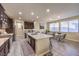 Eat-in kitchen with island, stainless steel appliances, and ample counter space at 6737 Fast Brook Ct, North Las Vegas, NV 89084