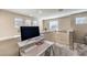 Home office with desk and neutral color scheme at 6737 Fast Brook Ct, North Las Vegas, NV 89084