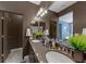 Modern bathroom featuring dual sinks, a large mirror, and stylish fixtures at 7017 Solana Ridge Dr, North Las Vegas, NV 89084