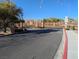 A gated community entrance with stone pillars and desert landscaping at 7017 Solana Ridge Dr, North Las Vegas, NV 89084