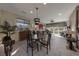 Open dining area adjacent to living space with neutral decor at 7017 Solana Ridge Dr, North Las Vegas, NV 89084