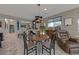 Charming dining area with a modern light fixture and a cozy atmosphere at 7017 Solana Ridge Dr, North Las Vegas, NV 89084