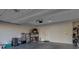 Spacious garage with ample storage space and overhead lighting at 7017 Solana Ridge Dr, North Las Vegas, NV 89084