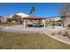 Community picnic area with covered tables, lush grass, and mature trees at 7017 Solana Ridge Dr, North Las Vegas, NV 89084