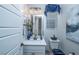 Simple bathroom with single vanity and white cabinets at 724 Last Dance Pl, Henderson, NV 89011