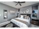 Spacious bedroom with king-size bed and gray color scheme at 724 Last Dance Pl, Henderson, NV 89011