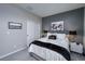 Bedroom with queen-size bed and gray accent wall at 724 Last Dance Pl, Henderson, NV 89011