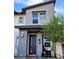 Modern two-story home with gray exterior and landscaped front yard at 724 Last Dance Pl, Henderson, NV 89011