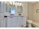 Modern bathroom with updated fixtures and double vanity at 7305 Backstretch Ave, Las Vegas, NV 89130