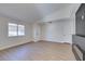 Living room with hardwood floors and a modern fireplace at 7305 Backstretch Ave, Las Vegas, NV 89130