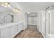 Bathroom with double vanity, walk-in shower, and large closet at 7479 Lassen Peak Cir, Las Vegas, NV 89149