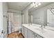 Bathroom with double vanity and a shower/tub combo at 7479 Lassen Peak Cir, Las Vegas, NV 89149