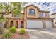 Beautiful two-story home with three car garage at 7479 Lassen Peak Cir, Las Vegas, NV 89149