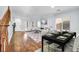 Open living and dining area with hardwood floors at 7479 Lassen Peak Cir, Las Vegas, NV 89149