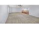 Spacious loft area with carpeted floor and ceiling fan at 7479 Lassen Peak Cir, Las Vegas, NV 89149