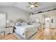 Main bedroom with a dresser and ensuite bathroom access at 7536 Spanish Bay Dr, Las Vegas, NV 89113