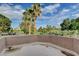 Private rooftop patio with golf course view and lush landscaping at 7536 Spanish Bay Dr, Las Vegas, NV 89113