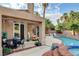 Relaxing pool and patio with seating area at 7536 Spanish Bay Dr, Las Vegas, NV 89113