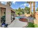 Brick steps lead to a refreshing pool and spa at 7536 Spanish Bay Dr, Las Vegas, NV 89113