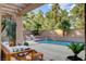 Spacious patio with pool and lush landscaping at 7536 Spanish Bay Dr, Las Vegas, NV 89113