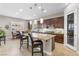 Spacious kitchen with granite countertops and pantry at 7576 Windy Meadow Ave, Las Vegas, NV 89178