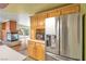 Kitchen boasts stainless steel refrigerator and microwave at 7645 Rustic Galleon St, Las Vegas, NV 89139