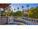 Scenic balcony view overlooking lush landscaping and palm trees at 8236 Horseshoe Bend Ln, Las Vegas, NV 89113