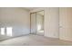 Bedroom with mirrored closet doors and carpet at 8236 Horseshoe Bend Ln, Las Vegas, NV 89113